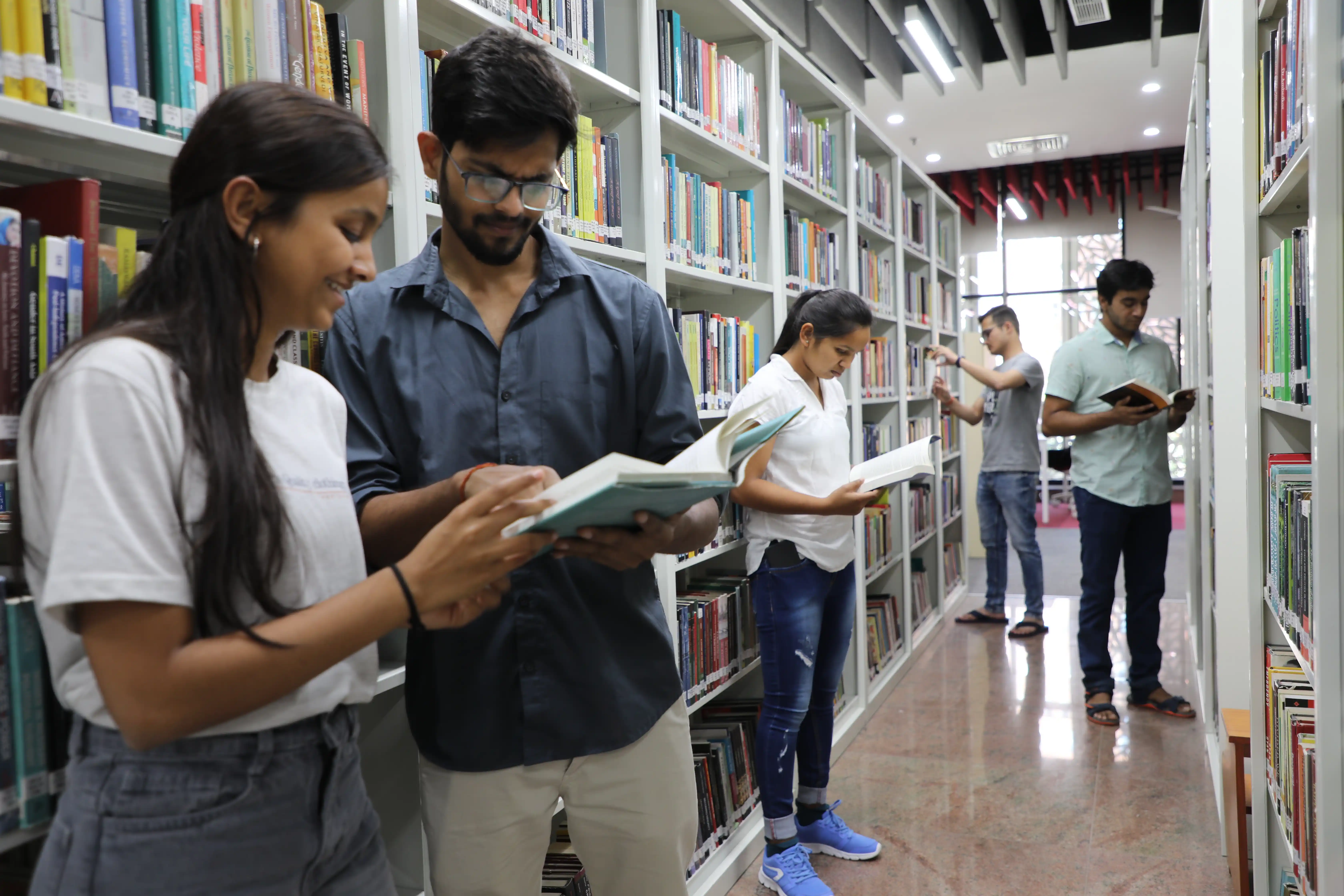 Students collaborating on a laptop in a computer science learning environment
