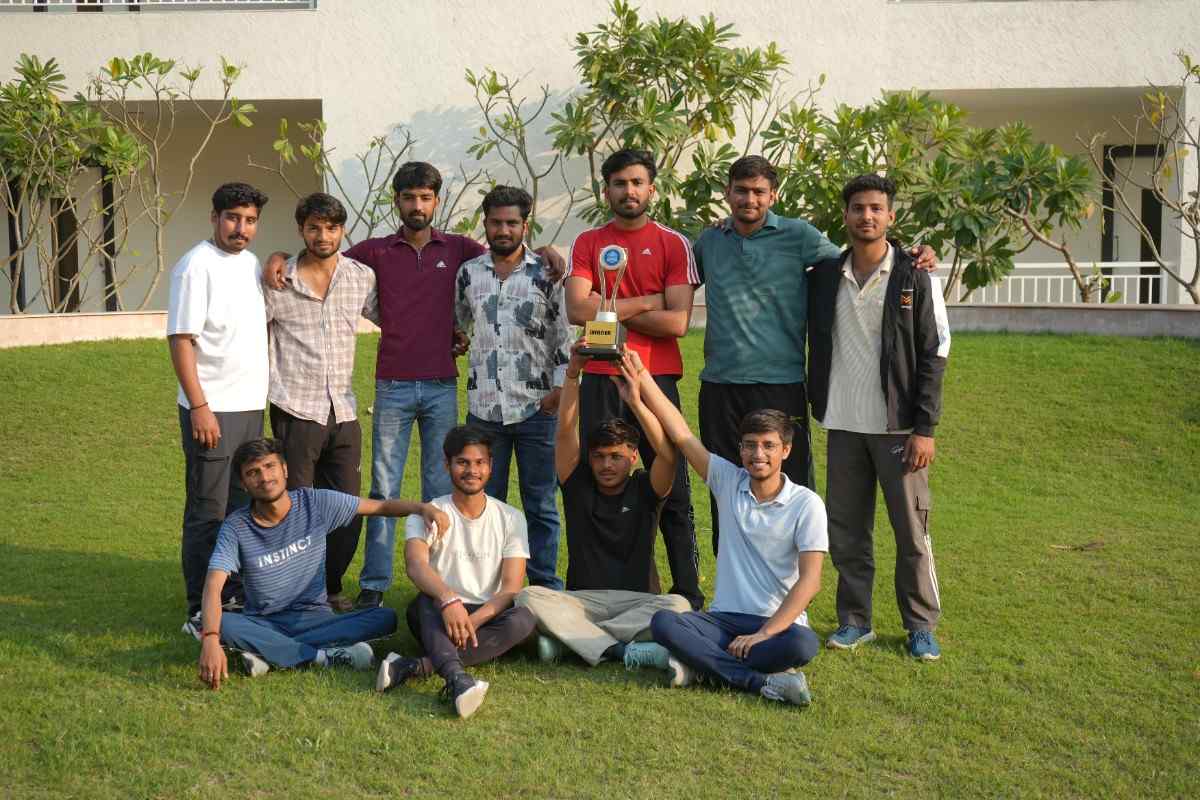 Winning sports team with trophy