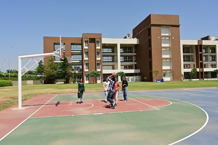 Students playing basketball